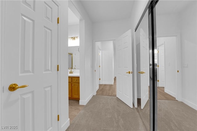 2167 Fairweather St, Henderson, NV 89052 - corridor with light carpet and baseboards