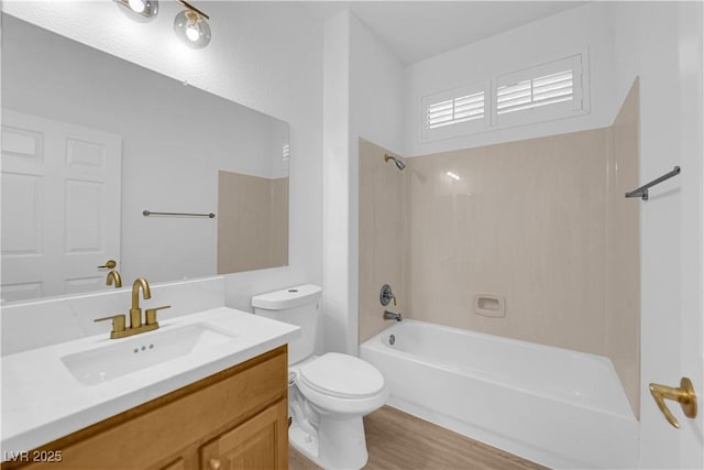 2167 Fairweather St, Henderson, NV 89052 - bathroom featuring vanity, washtub / shower combination, and wood finished floors