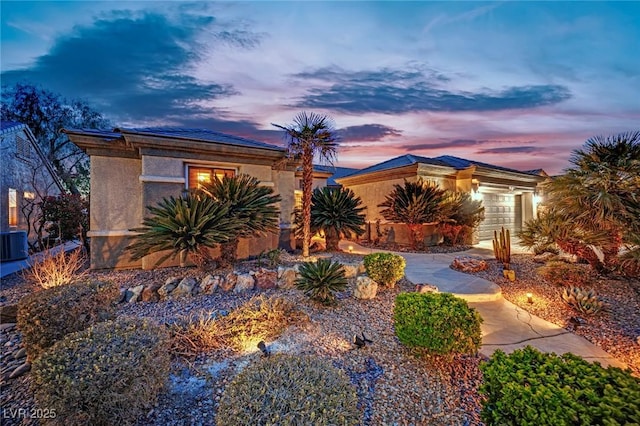 2167 Fairweather St, Henderson, NV 89052 - view of front of home featuring a garage and stucco siding