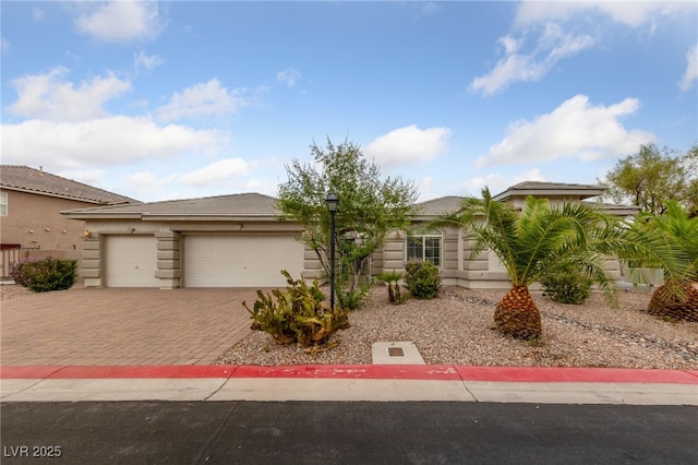 9208 Brilliant Ore Dr, Las Vegas, NV 89143 - view of front of property featuring driveway and a garage