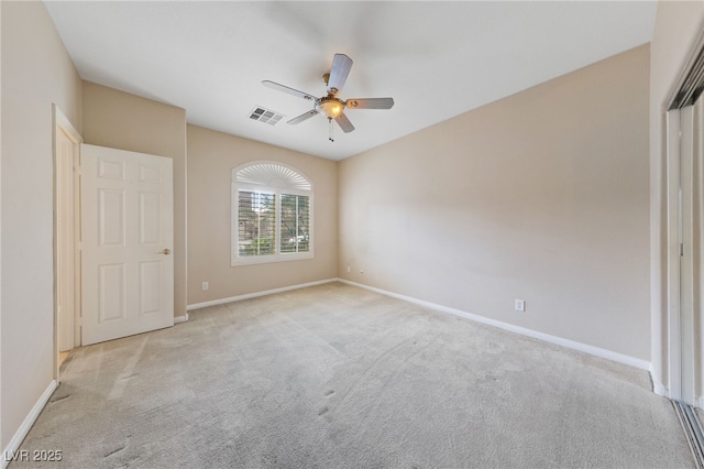 9208 Brilliant Ore Dr, Las Vegas, NV 89143 - unfurnished bedroom with light colored carpet and a ceiling fan