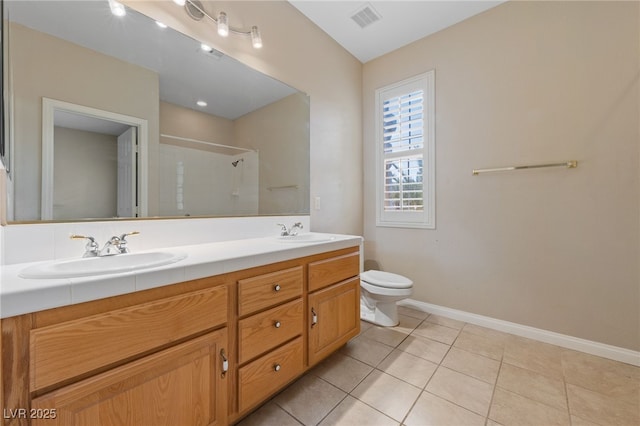 9208 Brilliant Ore Dr, Las Vegas, NV 89143 - full bath with double vanity, a shower with door, and tile patterned floors