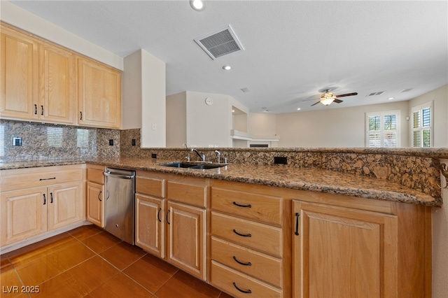 9208 Brilliant Ore Dr, Las Vegas, NV 89143 - kitchen featuring stainless steel dishwasher, light brown cabinetry, a ceiling fan, stone counters, and recessed lighting