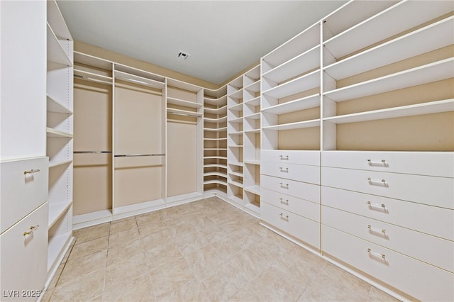 9208 Brilliant Ore Dr, Las Vegas, NV 89143 - walk in closet featuring light tile patterned floors