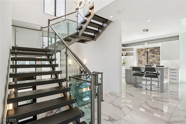 426 Tranquil Peak Ct, Henderson, NV 89012 - stairs with marble tiled flooring and recessed lighting