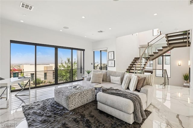 426 Tranquil Peak Ct, Henderson, NV 89012 - living room with marble tiled flooring, stairway, and recessed lighting