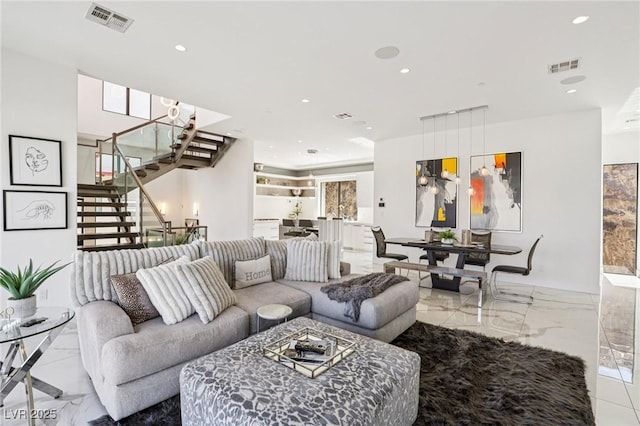 426 Tranquil Peak Ct, Henderson, NV 89012 - living area featuring stairs, marble tiled flooring, and recessed lighting