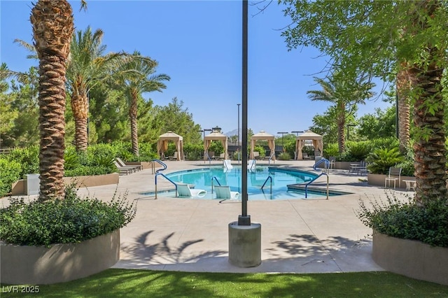 426 Tranquil Peak Ct, Henderson, NV 89012 - community pool featuring a gazebo and a patio area