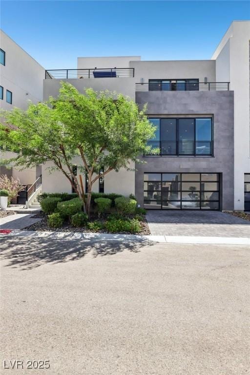426 Tranquil Peak Ct, Henderson, NV 89012 - view of building exterior featuring a garage and driveway