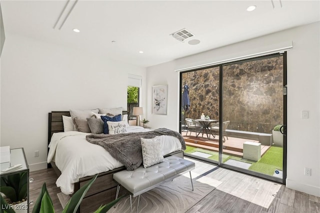 426 Tranquil Peak Ct, Henderson, NV 89012 - bedroom with access to outside, wood finished floors, and recessed lighting