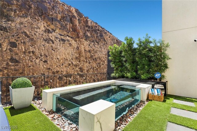 426 Tranquil Peak Ct, Henderson, NV 89012 - view of pool featuring a hot tub and a mountain view