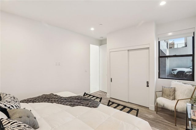 426 Tranquil Peak Ct, Henderson, NV 89012 - bedroom featuring light wood-type flooring, recessed lighting, and a closet