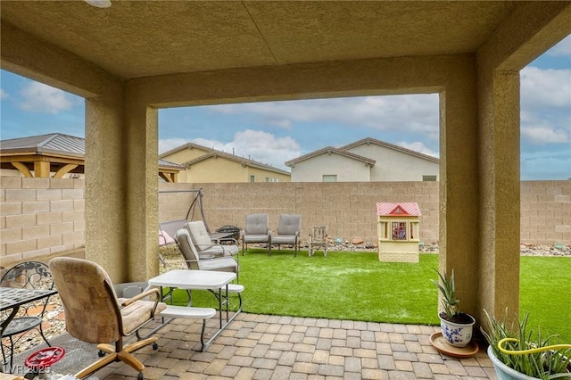 2807 Lindsey Springs St, Las Vegas, NV 89142 - fenced backyard with a patio