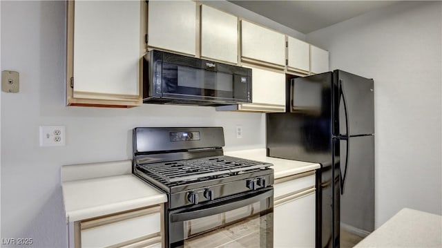 2200 S Fort Apache Rd Unit 1025, Las Vegas, NV 89117 - kitchen with black appliances and light countertops