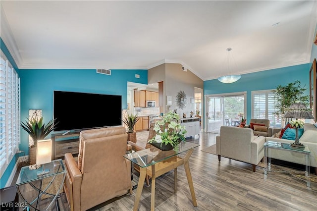 10800 Albright Pl, Las Vegas, NV 89134 - living area with crown molding and light wood finished floors