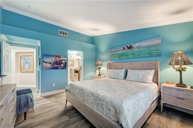 10800 Albright Pl, Las Vegas, NV 89134 - bedroom with wood finished floors, ornamental molding, and ensuite bath