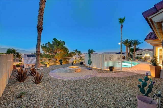 10800 Albright Pl, Las Vegas, NV 89134 - fenced backyard featuring a fire pit and a patio area
