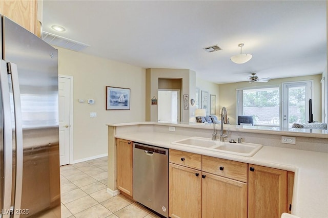 4508 Regalo Bello St, Las Vegas, NV 89135 - kitchen featuring stainless steel appliances, ceiling fan, light countertops, and light tile patterned floors