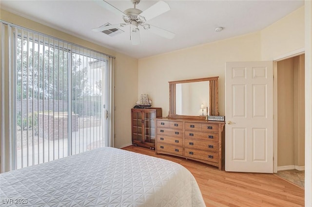 4508 Regalo Bello St, Las Vegas, NV 89135 - bedroom with access to exterior, light wood-style flooring, and ceiling fan