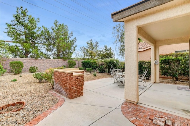 4508 Regalo Bello St, Las Vegas, NV 89135 - fenced backyard with a patio area and outdoor dining space