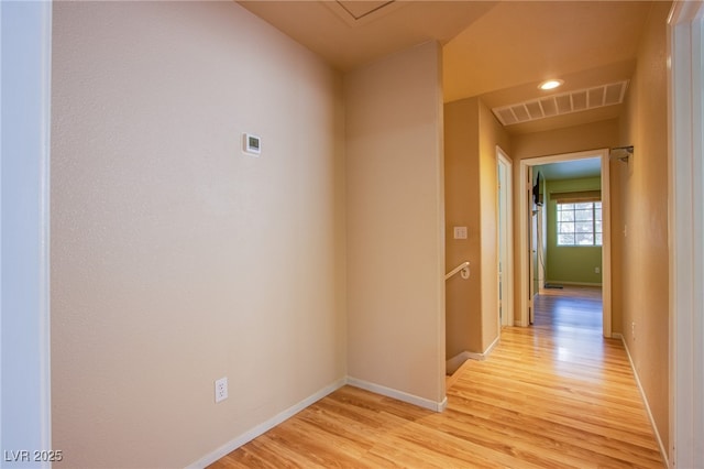 5587 Stomping Boots Ave, Las Vegas, NV 89118 - hallway with light wood-style floors and baseboards