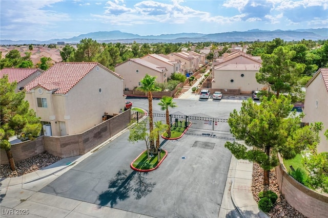 5587 Stomping Boots Ave, Las Vegas, NV 89118 - aerial view of residential area with a mountain backdrop