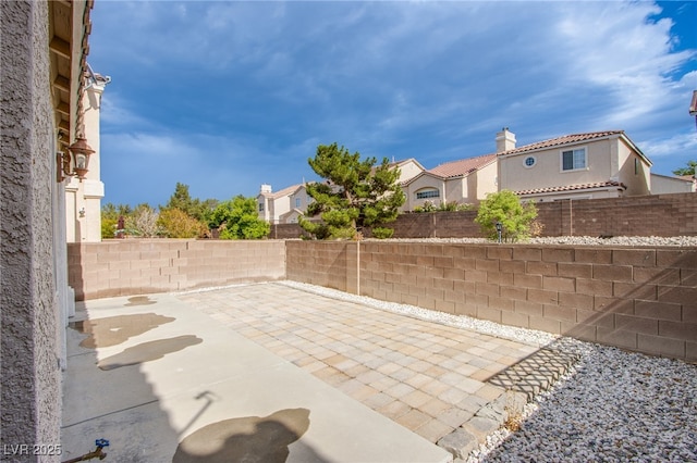 5587 Stomping Boots Ave, Las Vegas, NV 89118 - fenced backyard featuring a patio area