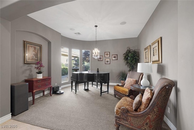 3668 Hillary Elan Ct, Las Vegas, NV 89139 - living area featuring light colored carpet and a chandelier