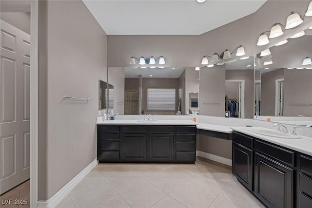 3668 Hillary Elan Ct, Las Vegas, NV 89139 - full bath with two vanities, tile patterned floors, and a shower