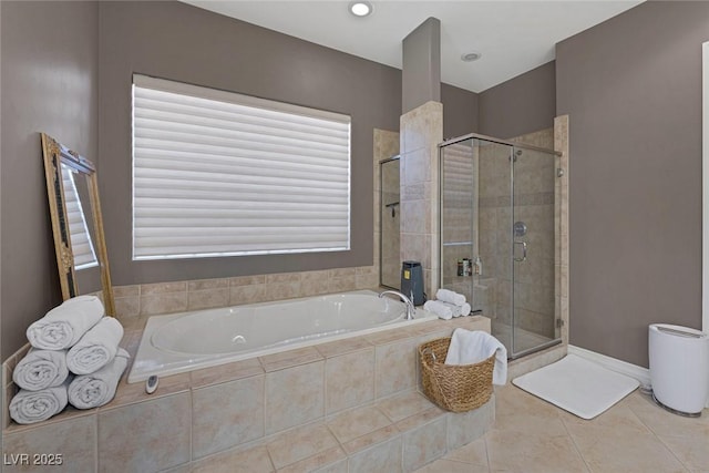 3668 Hillary Elan Ct, Las Vegas, NV 89139 - full bath with a garden tub, a shower stall, and tile patterned flooring