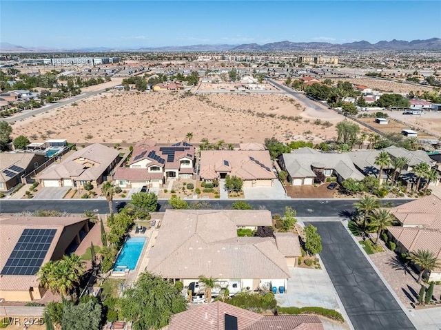 3668 Hillary Elan Ct, Las Vegas, NV 89139 - aerial perspective of suburban area with a mountain backdrop and a pool area