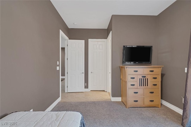 3668 Hillary Elan Ct, Las Vegas, NV 89139 - bedroom with light colored carpet and light tile patterned flooring