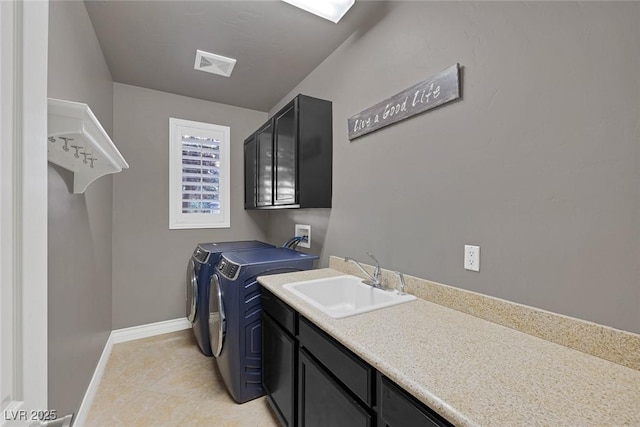 3668 Hillary Elan Ct, Las Vegas, NV 89139 - laundry area with cabinet space, independent washer and dryer, and light tile patterned floors