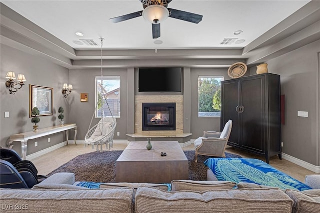 3668 Hillary Elan Ct, Las Vegas, NV 89139 - living area with a glass covered fireplace, a ceiling fan, and recessed lighting