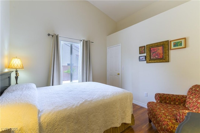 5620 Silver Belle St, Las Vegas, NV 89149 - bedroom featuring dark wood-style flooring and baseboards
