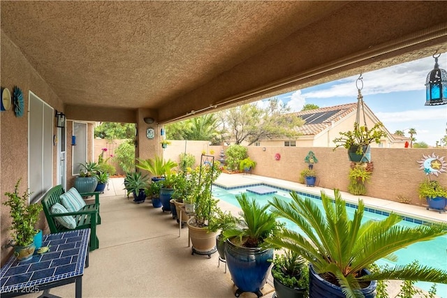 5620 Silver Belle St, Las Vegas, NV 89149 - fenced backyard with a patio area