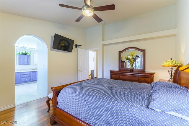 5620 Silver Belle St, Las Vegas, NV 89149 - bedroom featuring wood finished floors, a ceiling fan, and ensuite bath