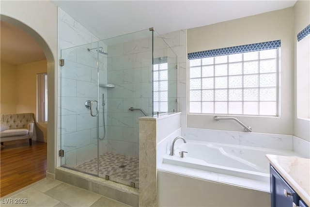 5620 Silver Belle St, Las Vegas, NV 89149 - bathroom with a bath, a shower stall, and vanity