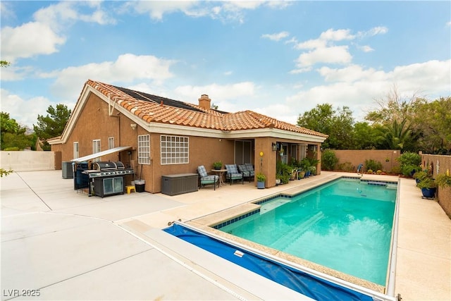 5620 Silver Belle St, Las Vegas, NV 89149 - view of pool featuring a patio area, a fenced backyard, area for grilling, and an outdoor living space