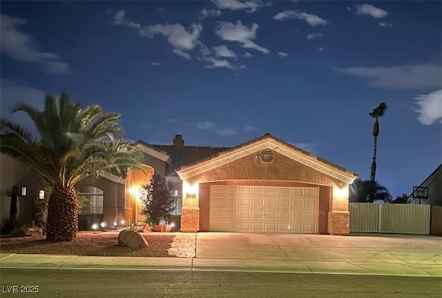5620 Silver Belle St, Las Vegas, NV 89149 - view of front of home featuring concrete driveway and a garage