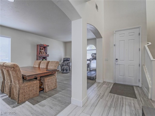 7375 Emerald Glow St, Las Vegas, NV 89123 - entryway featuring arched walkways and light wood-style flooring