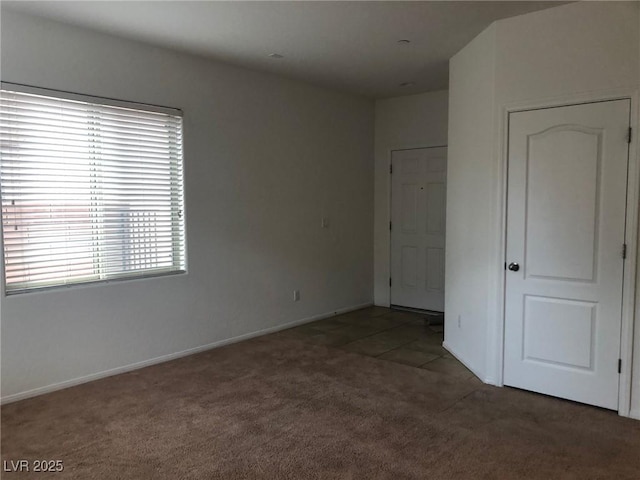 714 Calamus Palm Pl, Henderson, NV 89011 - unfurnished bedroom featuring carpet flooring and baseboards