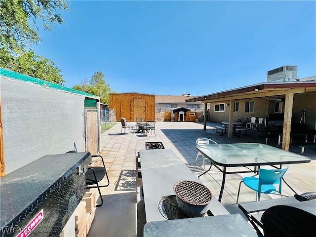 4109 Studio St, Las Vegas, NV 89115 - fenced backyard with a patio and outdoor dining area