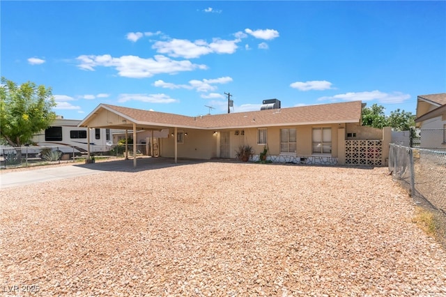 4436 E Ogden Ave, Las Vegas, NV 89110 - view of front of property featuring a carport and driveway