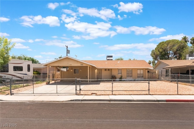 4436 E Ogden Ave, Las Vegas, NV 89110 - view of front of property featuring a fenced front yard, a carport, a gate, and concrete driveway