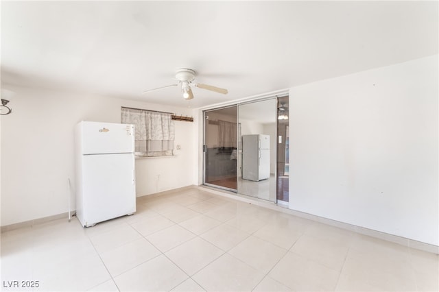 4436 E Ogden Ave, Las Vegas, NV 89110 - unfurnished room with ceiling fan and light tile patterned flooring