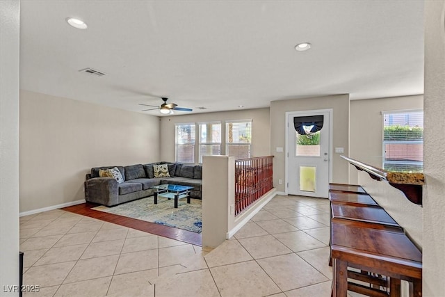 609 Doubleshot Ln, Henderson, NV 89052 - living room featuring healthy amount of natural light, light tile patterned flooring, a ceiling fan, and recessed lighting