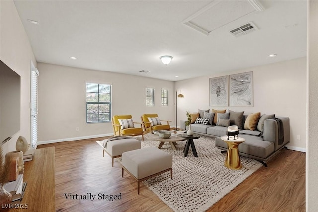 609 Doubleshot Ln, Henderson, NV 89052 - living area featuring wood finished floors, attic access, and recessed lighting