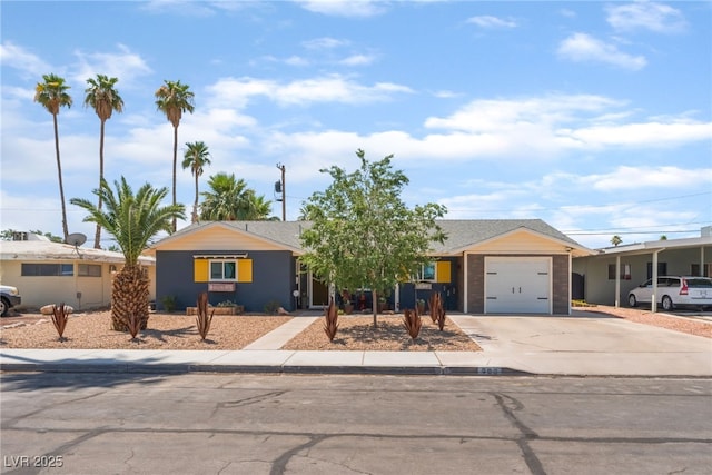 908 Bonita Ave, Las Vegas, NV 89104 - ranch-style house with driveway and an attached garage