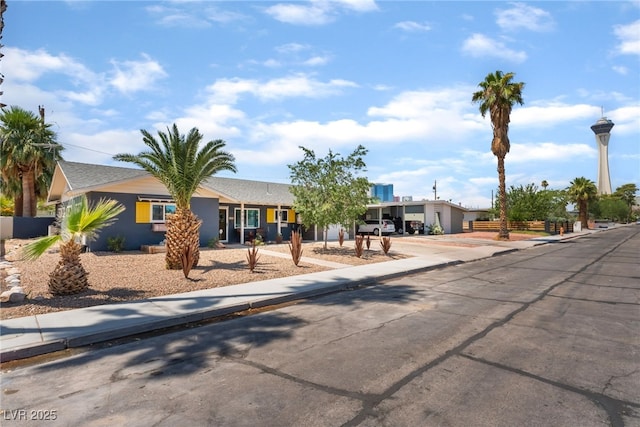 908 Bonita Ave, Las Vegas, NV 89104 - view of front of house featuring driveway and stucco siding